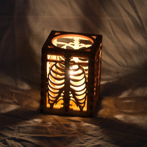 Tea light luminary made of laser cut wood 