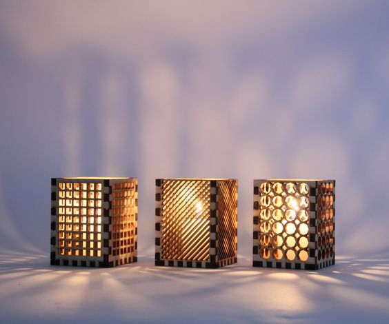 three laser cut candle holders x 